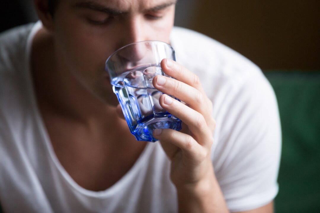  Water boosts immunity, lubricates joints, and helps your body keep a balance of electrolytes.(fizkes/Shutterstock)