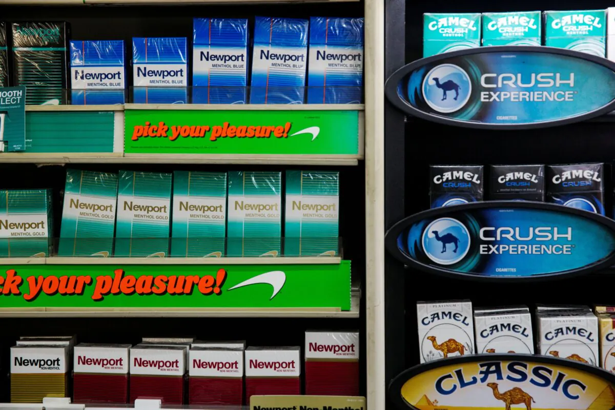 Newport and Camel cigarettes are stacked on a shelf inside a tobacco store in New York in a file photograph. (Lucas Jackson/Reuters)
