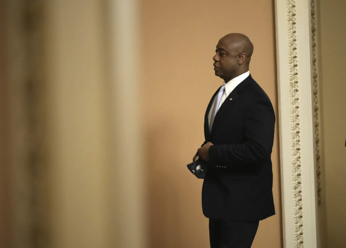 Sen. Tim Scott (R-S.C.) walks through the U.S. Capitol before delivering the Republican response to President Biden's address to Congress in Washington on April 28, 2021. (Drew Angerer/Getty Images)