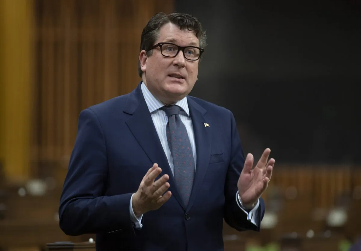 Conservative MP John Williamson rises uring Question Period in the House of Commons in Ottawa, on April 13, 2021. (Adrian Wyld/The Canadian Press)