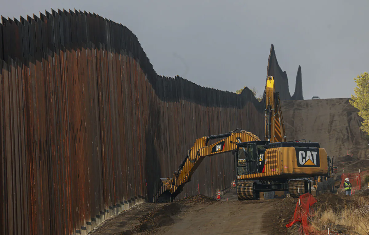 Work is done on a new border wall being constructed in Jacumba, Calif., on Jan. 22, 2021. (Sandy Huffaker/Getty Images)