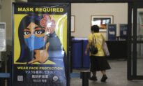 US Keeps in Place Mask Requirement on Planes, Transit
