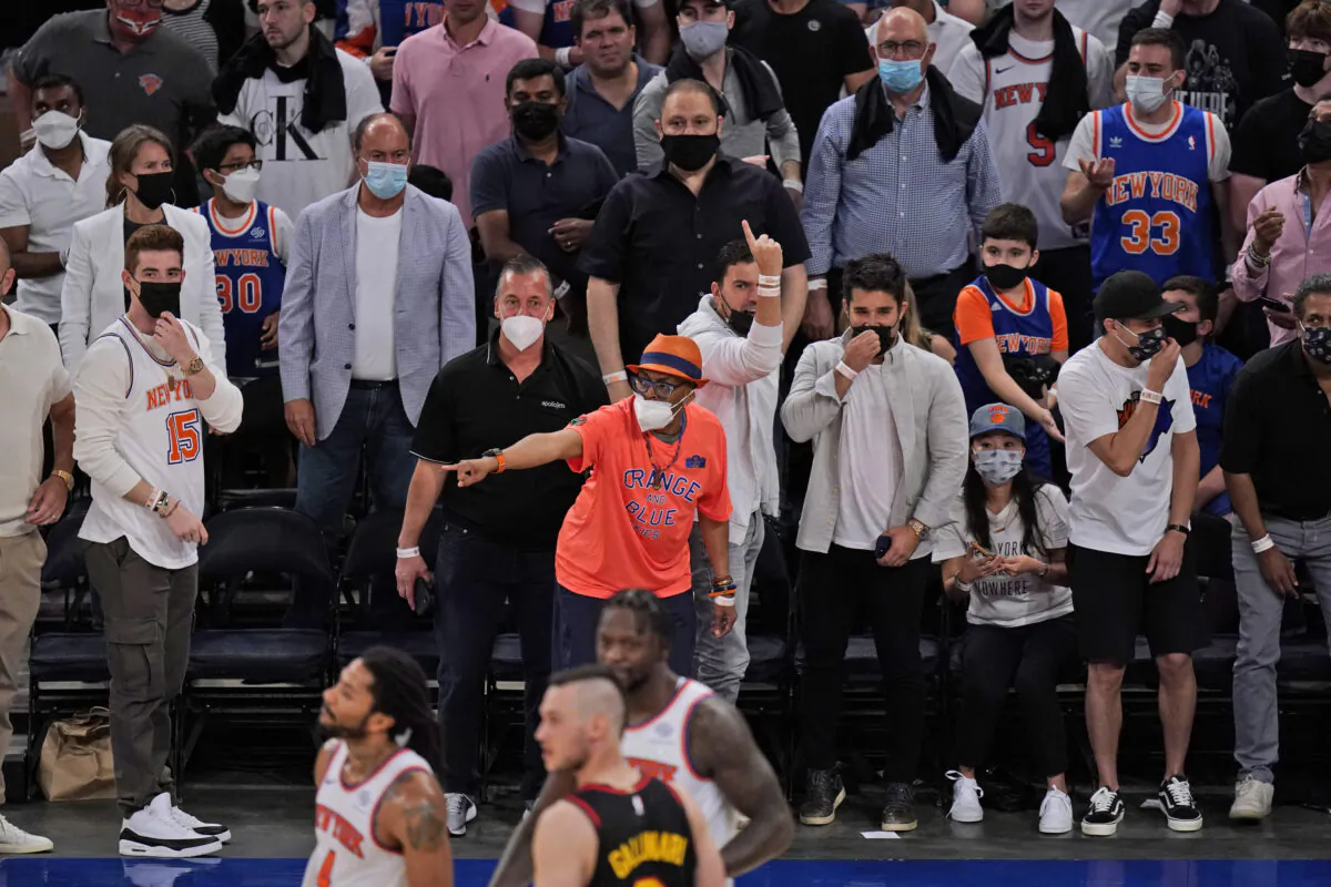 The crowd reacts during the first half of Game 1 of an NBA basketball first-round playoff series between the New York Knicks and the Atlanta Hawks on May 23, 2021 in New York. (Seth Wenig - Pool/Getty Images)