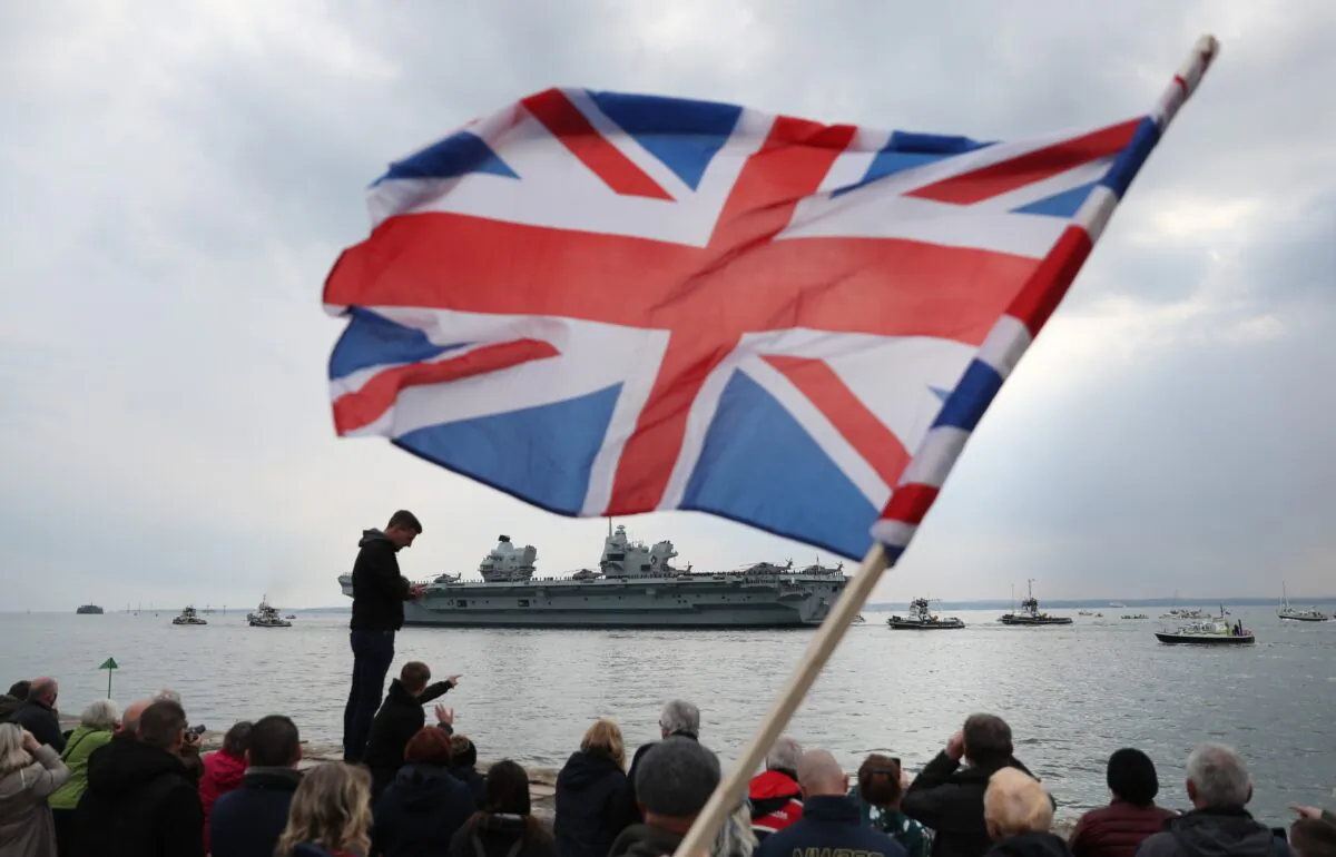 The Royal Navy aircraft carrier HMS Queen Elizabeth leaves Portsmouth Naval Base in Hampshire for exercises off Scotland before heading to the Indo-Pacific region, on May 1, 2021. (PA)