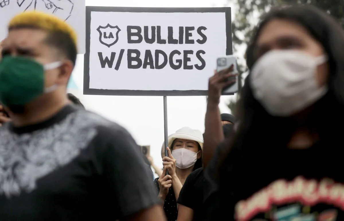 Black Lives Matter–Los Angeles supporters protest outside the Unified School District headquarters in Los Angeles, calling on the board of education to defund school police on June 23, 2020. (Mario Tama/Getty Images)