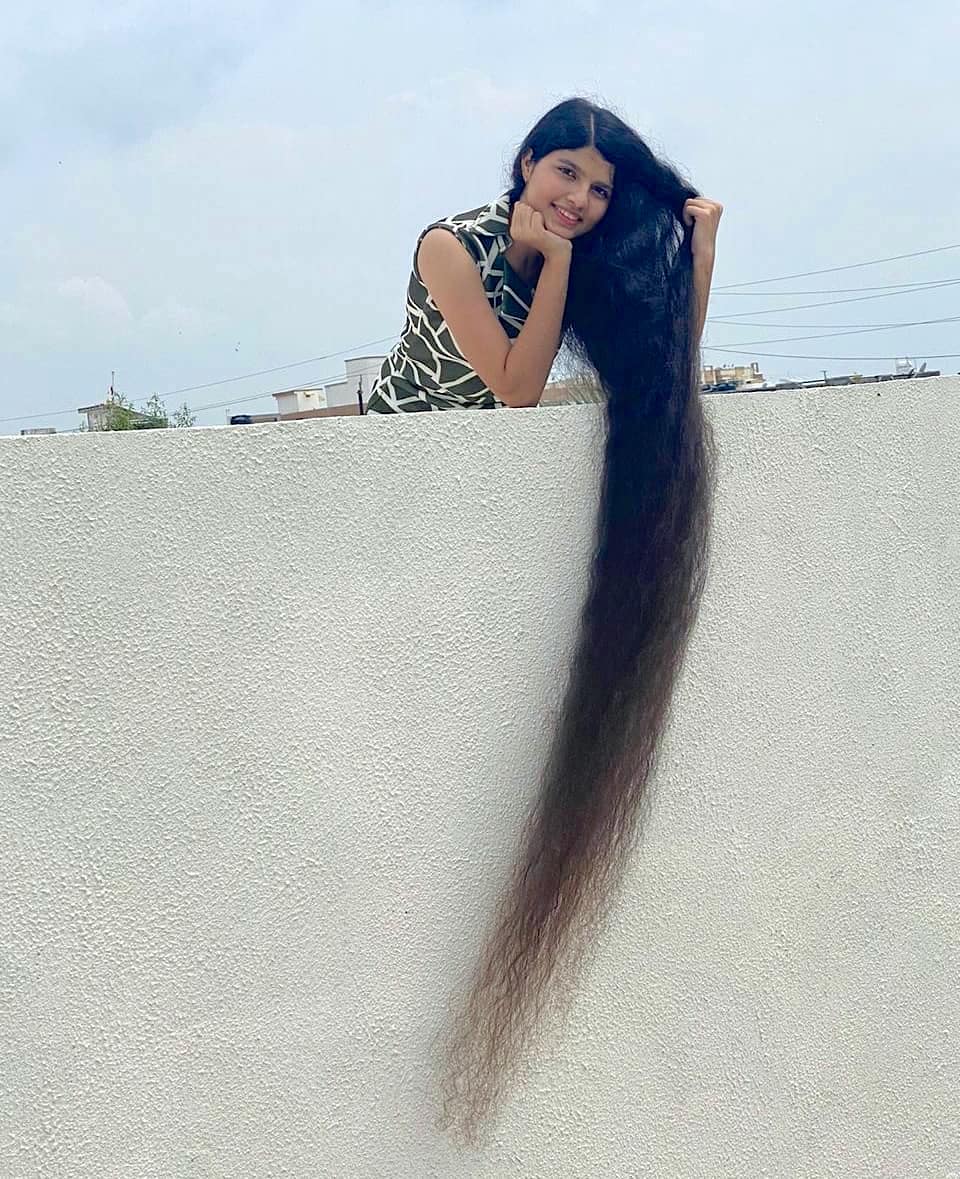 Teen Who Set Guinness World Record For Longest Hair Donates It To Inspire Others To Do The Same