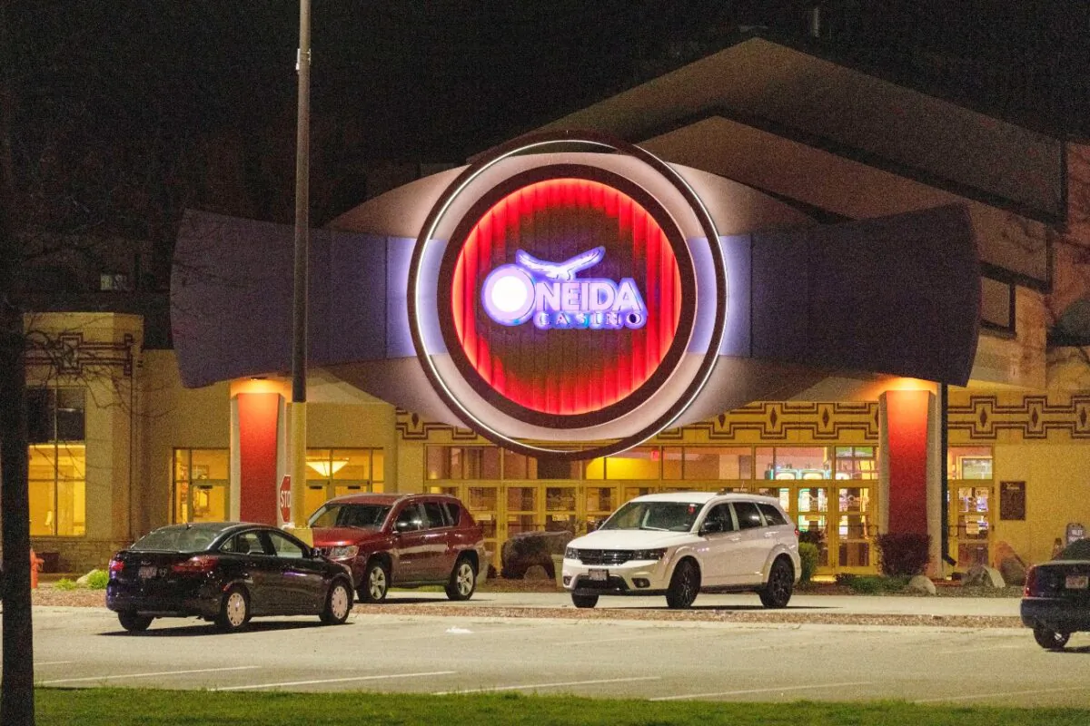 The Oneida Casino lights glow in the parking lot in the early morning hours of Sunday, near Green Bay, Wis., on May 2, 2021. (Mike Roemer/AP Photo)