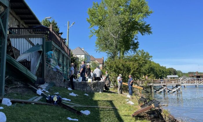 A deck collapsed at a restaurant in Tennessee on Saturday, resulting in at least 11 people being hospitalized, officials said. Two people were critically injured. (Hamilton County, TN Office of Emergency Management & Homeland Security.)