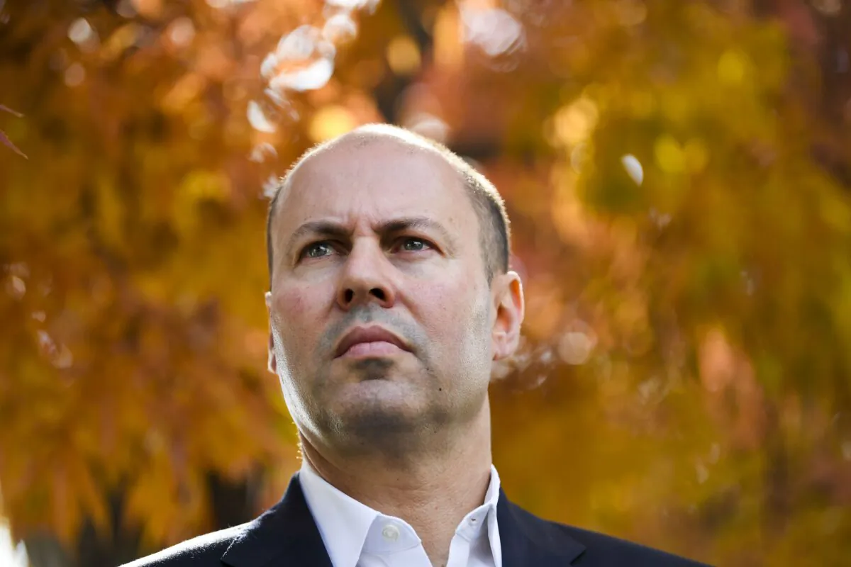 Australian Treasurer Josh Frydenberg speaks to the media during a visit to Narrabundah Cottage Childcare Centre in Canberra, Australia, on May 2, 2021. (AAP Image/Lukas Coch)