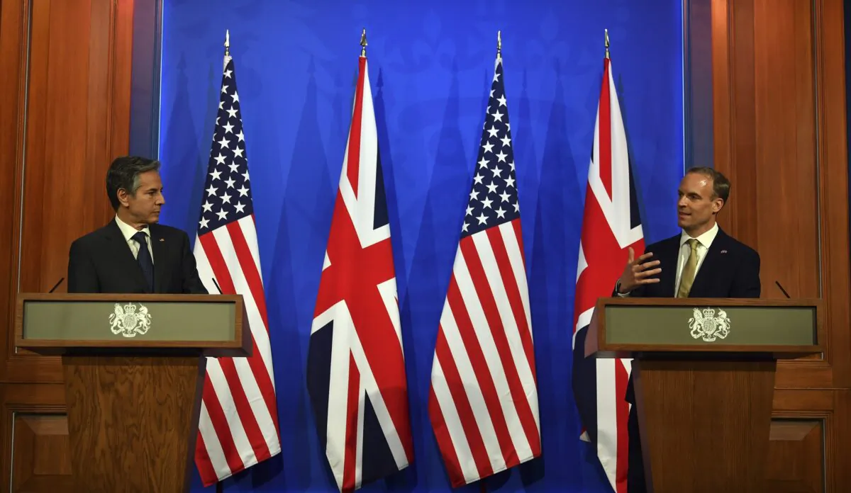 Britain's Foreign Secretary Dominic Raab, right, and US Secretary of State Antony Blinken attend a joint press conference at Downing Street in London, Monday, May 3, 2021, during the G7 foreign ministers meeting. (Ben Stansall/Pool Photo via AP)
