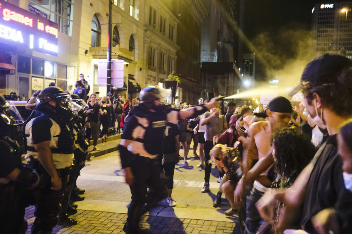 Police and protesters clash after a peaceful demonstration near the Ohio Statehouse turned into a riot, in Columbus, Ohio, on May 28, 2020. (Matthew Hatcher/Getty Images)