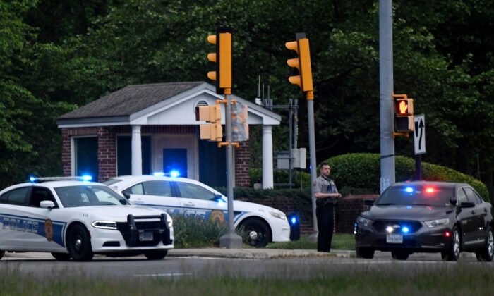 Police cars are seen outside the CIA headquarters's gate after an attempted intrusion earlier in the day in Langley, Va., on May 3, 2021. (Olivier Douliery/AFP via Getty Images)