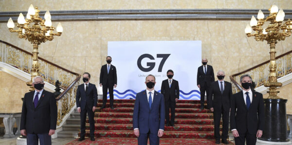 G7 foreign ministers wear face masks and are socially distanced for a group photo