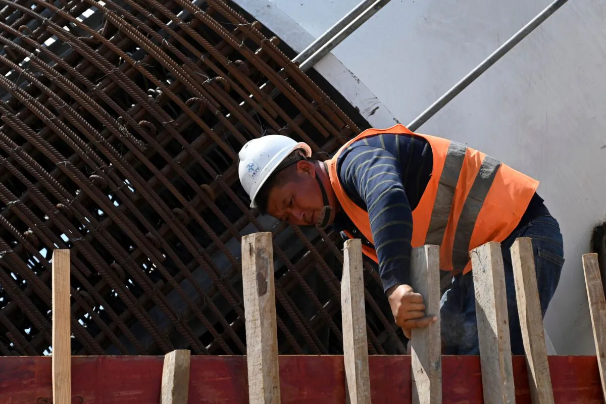 A Chinese laborer works at a construction site of Colombo Port City, a part of China's trillion-dollar Belt and Road plan in Colombo, Sri Lanka, on Feb. 24, 2020. (Ishara S. Kodikara/AFP via Getty Images)