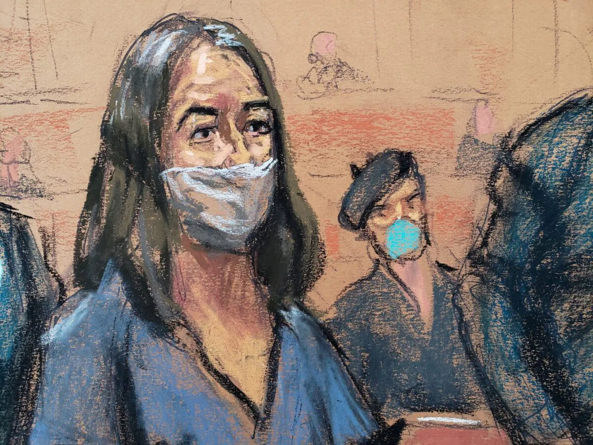 In this courtroom sketch, British socialite Ghislaine Maxwell appears during her arraignment hearing on a new indictment at Manhattan Federal Court in New York City, on April 23, 2021. (Jane Rosenberg/Reuters)