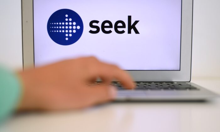  logo of job seeking website 'Seek' is seen on a screen in Canberra, Australia, Feb. 21, 2017. (AAP Image/Lukas Coch)