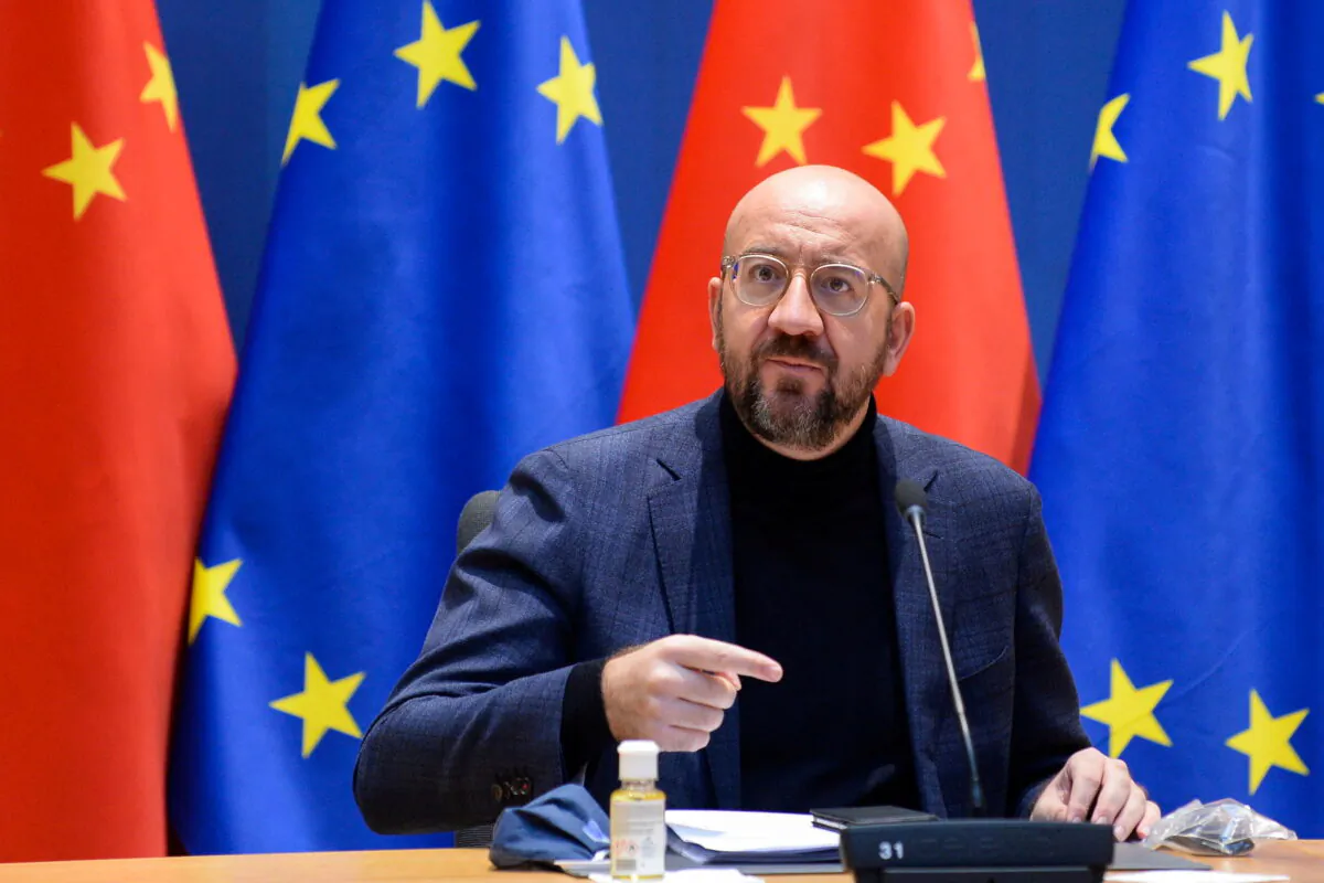 European Council President Charles Michel gestures during a video conference with European Commission President Ursula von der Leyen, German Chancellor Angela Merkel, French President Emmanuel Macron, and CCP head Xi Jinping, in Brussels, Belgium, on Dec. 30, 2020. (Johanna Geron/Pool/File Photo/Reuters)