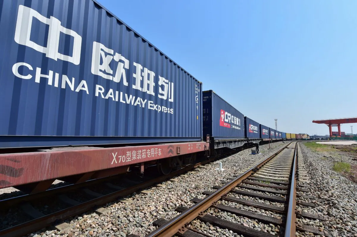 A freight train transporting containers laden with goods from London, arrives at Yiwu railway port station in Yiwu, east China's Zhejiang Province on April 29, 2017. (STR/AFP via Getty Images)