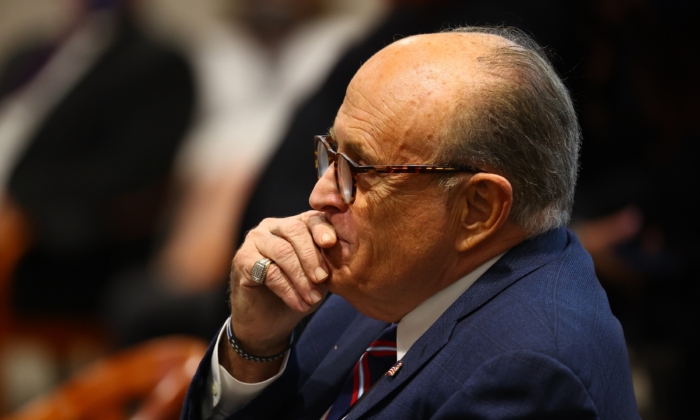 President Donald Trump's personal attorney Rudy Giuliani waits to testify before the Michigan House Oversight Committee in Lansing, Mich., on Dec. 2, 2020. (Rey Del Rio/Getty Images)