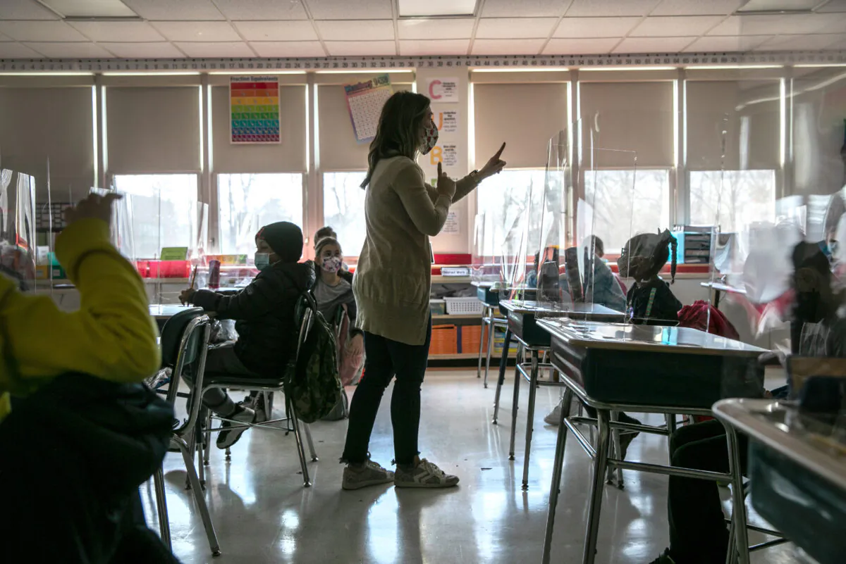 A teacher is seen in a classroom in a file photo. (John Moore/Getty Images)