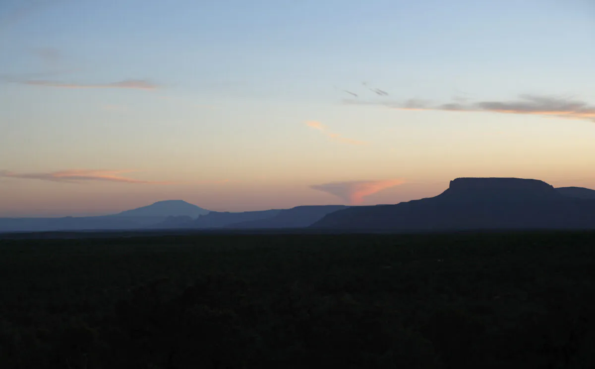 Bluff and mountain ridge-lines are silhouetted at sunset in the Bears Ears National Monument outside Blanding, Utah, on May 11, 2017. (George Frey/Getty Images)