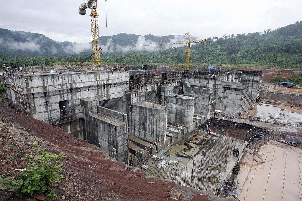 The regulating dam of the Nam Theun 2 power dam under construction is pictured in Laos' Nakai plateau on June 28, 2007. (Hoang Dinh Nam/AFP via Getty Images)