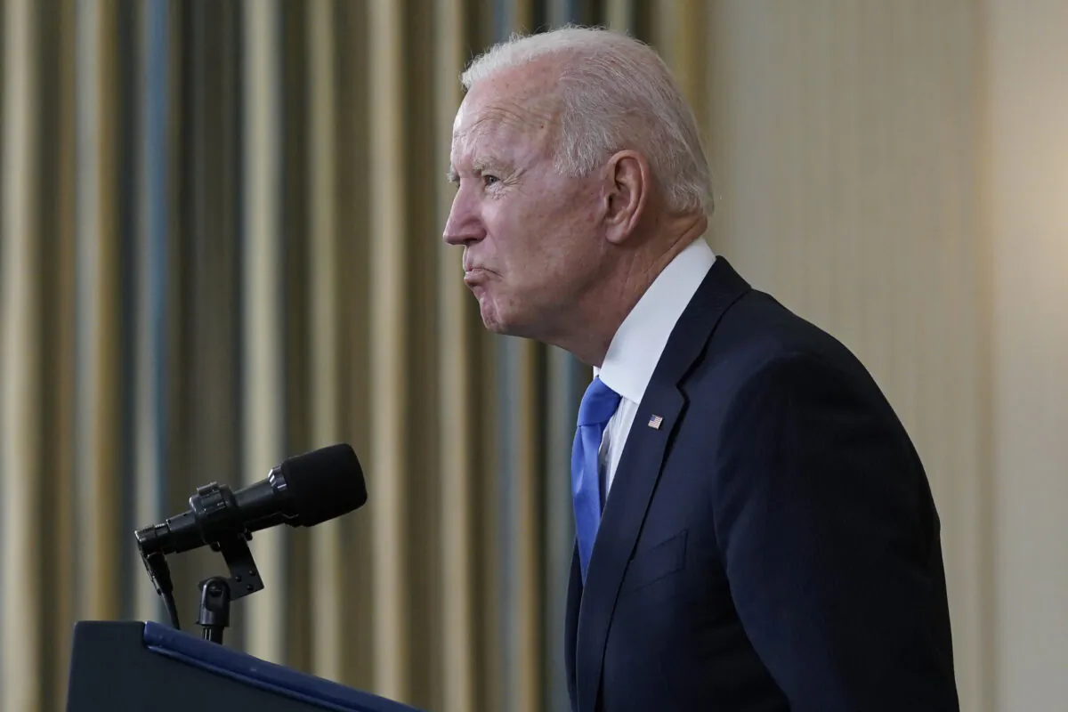 President Joe Biden takes questions from reporters in the State Dining Room of the White House on May 5, 2021. (Evan Vucci/AP Photo)