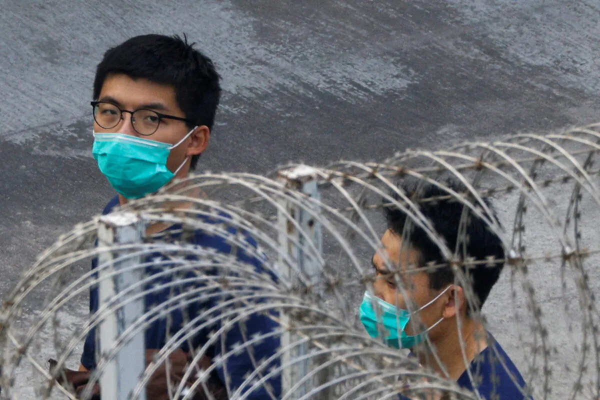 Pro-democracy activist Joshua Wong is seen in Lai Chi Kok Reception Centre after jailed for unauthorised assembly near the police headquarters during last year's anti-government protests in Hong Kong, China Dec. 3, 2020. (REUTERS/Tyrone Siu