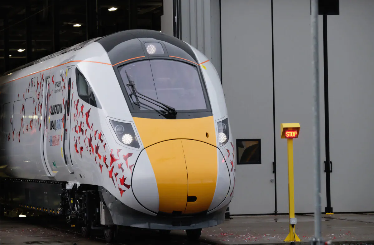The first British-built Intercity Express train is unveiled in front of invited guests at the Hitachi Rail Europe site in Newton Aycliffe, UK, on Dec. 9, 2016. (Ian Forsyth/Getty Images)