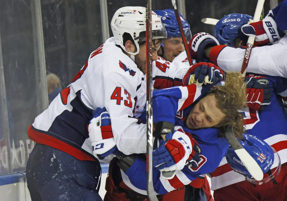 Tom Wilson (No. 43) of the Washington Capitals takes a roughing penalty against the New York Rangers' Artemi Panarin (No. 10) on May 3, 2021, in New York. (Bruce Bennett/Pool Photo via AP)