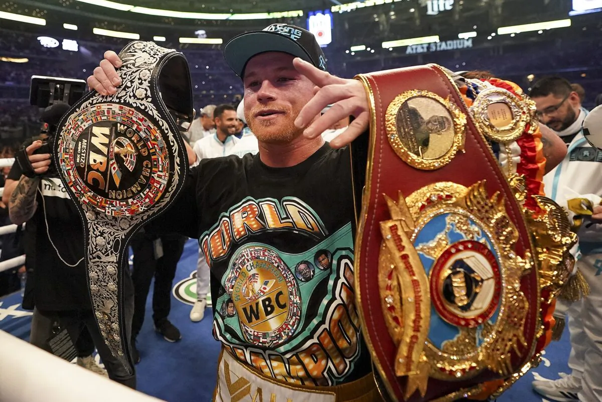Canelo Alvarez celebrates after defeating Billy Joe Saunders in a unified super middleweight world championship boxing match, in Arlington, Texas, on May 8, 2021. (Jeffrey McWhorter/AP Photo)