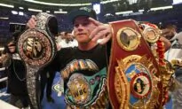 Alvarez Adds Another Title With 8th-Round TKO of Saunders