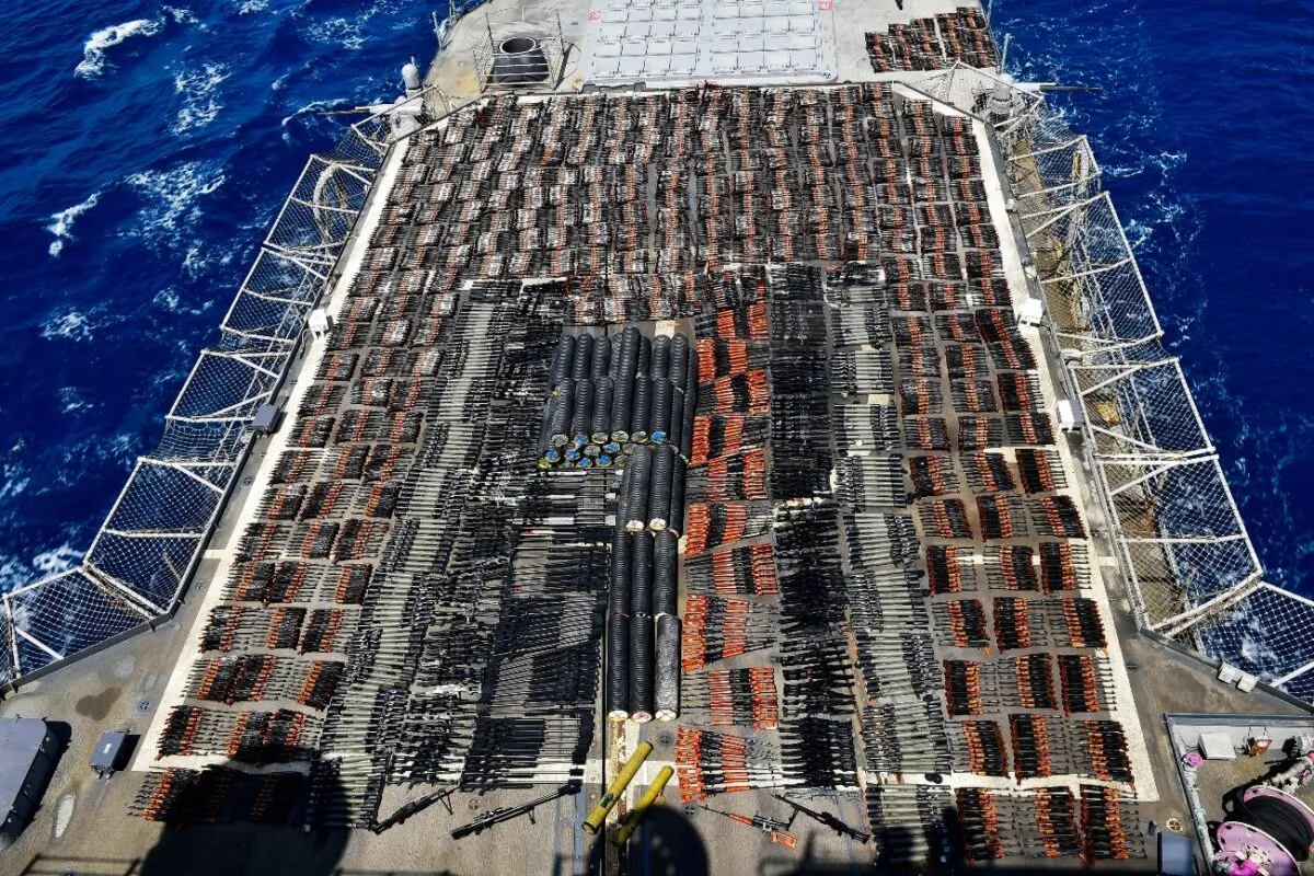 Weapons that the U.S. Navy described as coming from a hidden arms shipment aboard a stateless dhow are seen aboard the guided-missile cruiser USS Monterey, on May 8, 2021. (U.S. Navy via AP)