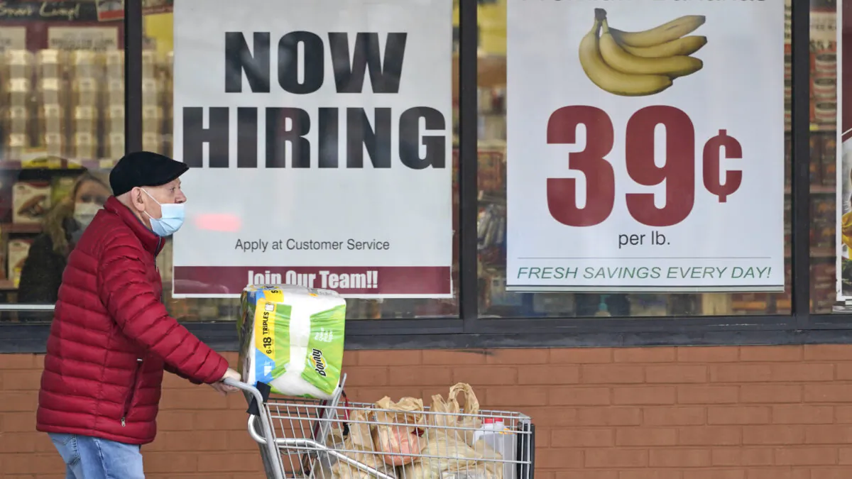 A man walks out of a Marc’s Store in Mayfield Heights, Ohio, on Jan. 8, 2021. (Tony Dejak/AP Photo)