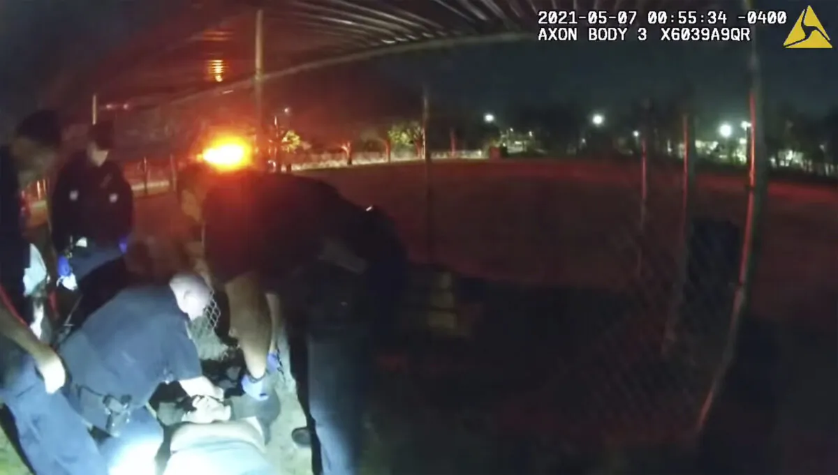 This photo taken from Providence Police body camera shows officers responding to a call of a man who was screaming outside in Providence, R.I., on May 7, 2021. (Providence Police Department via AP)