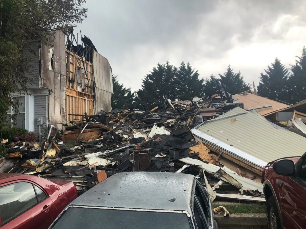 The site of a fire in Woodlawn, where three people were killed, including a suspect, and two others were injured, Md., on May 8, 2021. (Brian Witte/AP Photo)