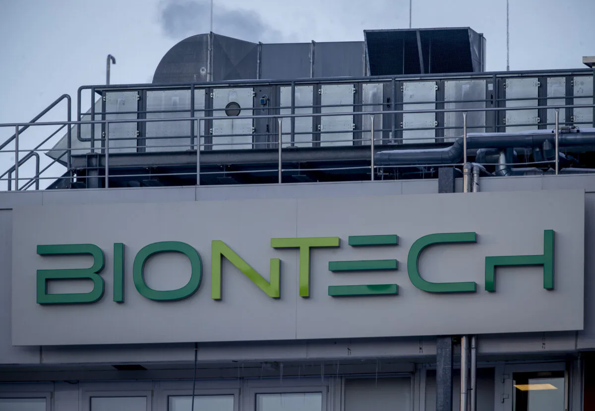 The BioNTech logo is seen at the building where production of the COVID-19 vaccine has started, in Marburg, Germany, on Feb. 13, 2021. (Michael Probst/AP Photo)