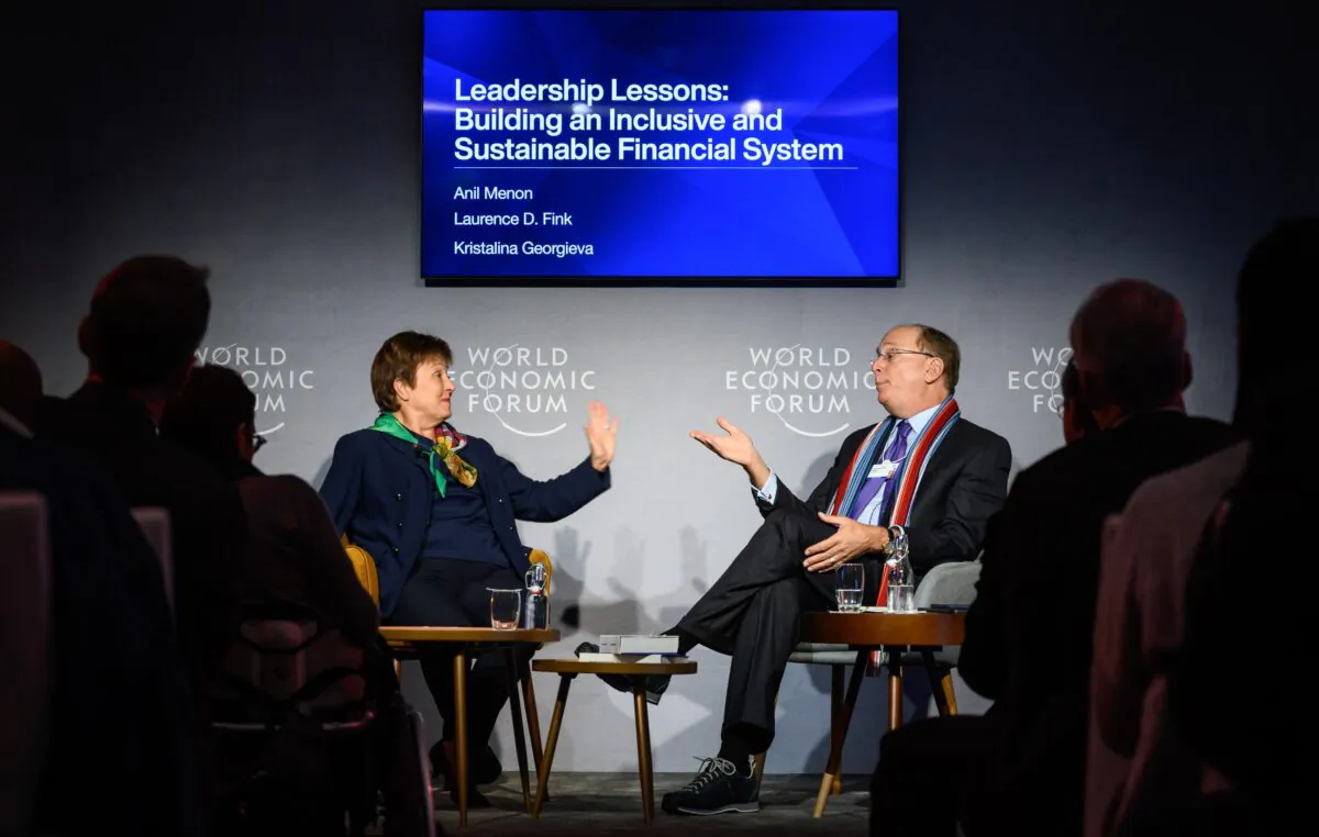 International Monetary Fund (IMF) Managing Director Kristalina Georgieva (L) talks with BlackRock Chair and CEO Laurence D. Fink during a session at the World Economic Forum (WEF) annual meeting in Davos, on Jan. 23, 2020. (Fabrice Coffrini/AFP via Getty Images)