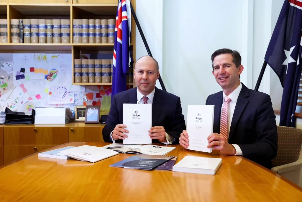 Treasurer Josh Frydenberg and Finance Minister Simon Birmingham with the 2021 budget papers at Parliament House on May 11, 2021 in Canberra, Australia. (Dominic Lorrimer - Pool/Getty Images)