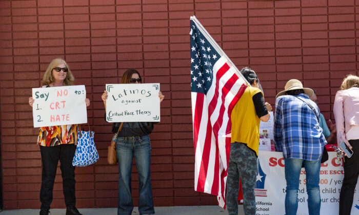 Demonstrators gather in front of Los Alamitos Unified School District Headquarters in protest of critical race theory teachings in Los Alamitos, Calif., on May 11, 2021. (John Fredricks/The Epoch Times)