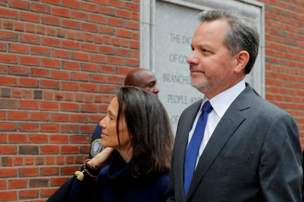 William McGlashan Jr., a former executive at TPG private equity firm facing charges in a nationwide college admissions cheating scheme, arrives at the federal courthouse in Boston, Mass., on March 29, 2019. (Brian Snyder/Reuters)