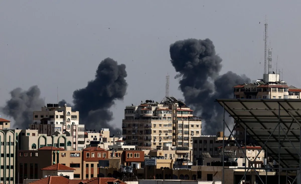 Smoke billows from Israeli air strikes in the Gaza Strip on May 11, 2021. (Mahmud Hams/AFP/Getty Images)