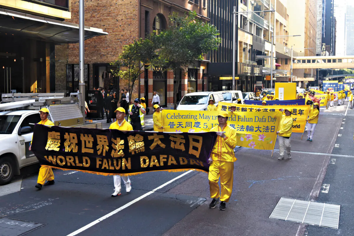 Falun Gong practitioners participating in a rally and parade in the CBD of Sydney, Australia on May 13, 2021. 
(Shen Ke/The Epoch Times)
