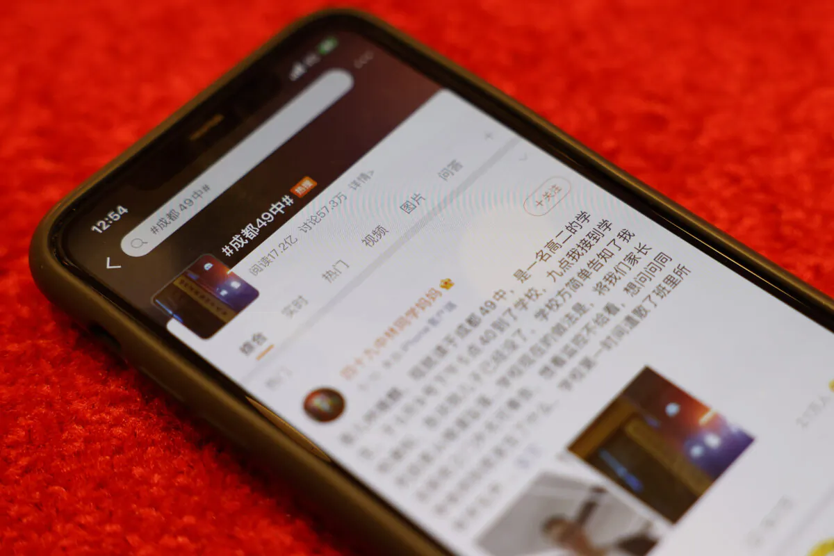 A Weibo page about the death of a student in Chengdu with 1.72 billion views is displayed on a mobile phone in Beijing, China, on May 13, 2021. (Ng Han Guan/AP Photo)