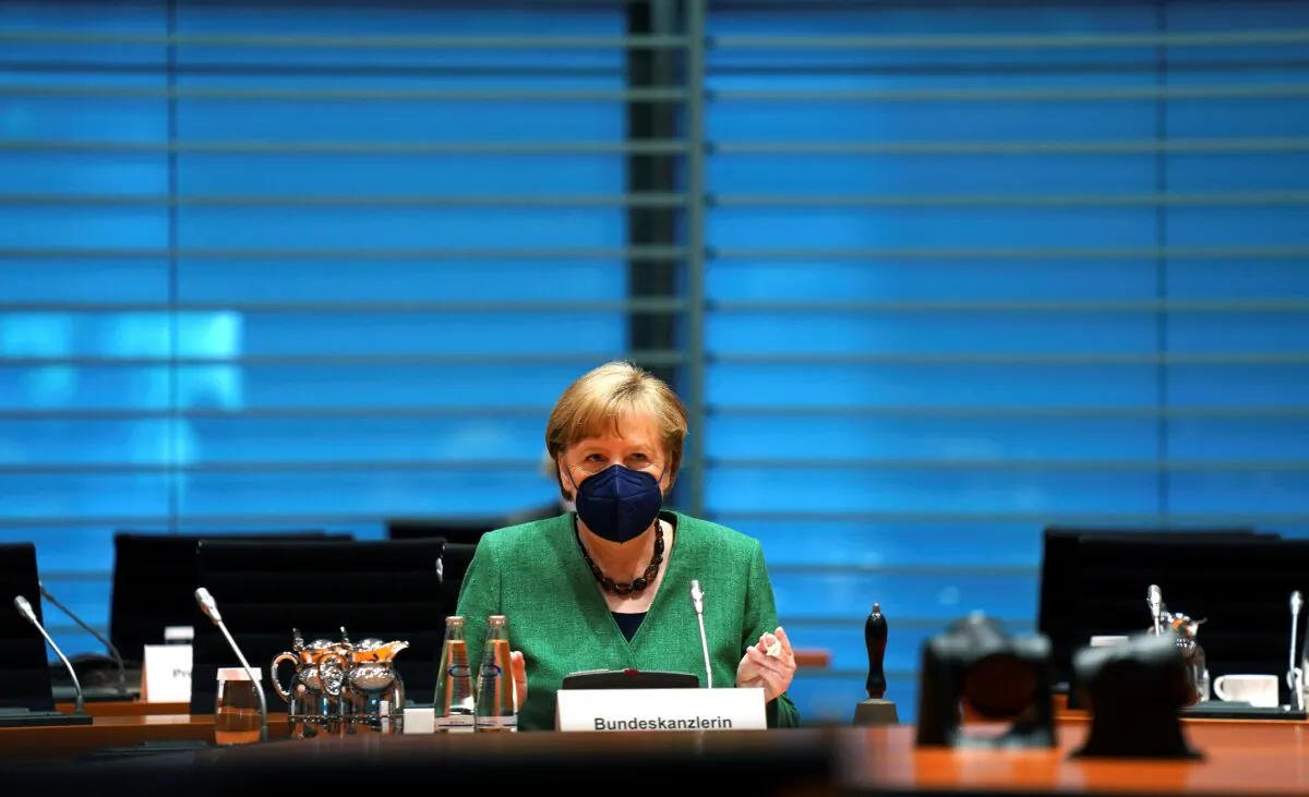 German Chancellor Angela Merkel arrives for the weekly cabinet meeting at the Chancellery in Berlin, Germany, on May 12, 2021. (Michael Sohn/Pool via Reuters)