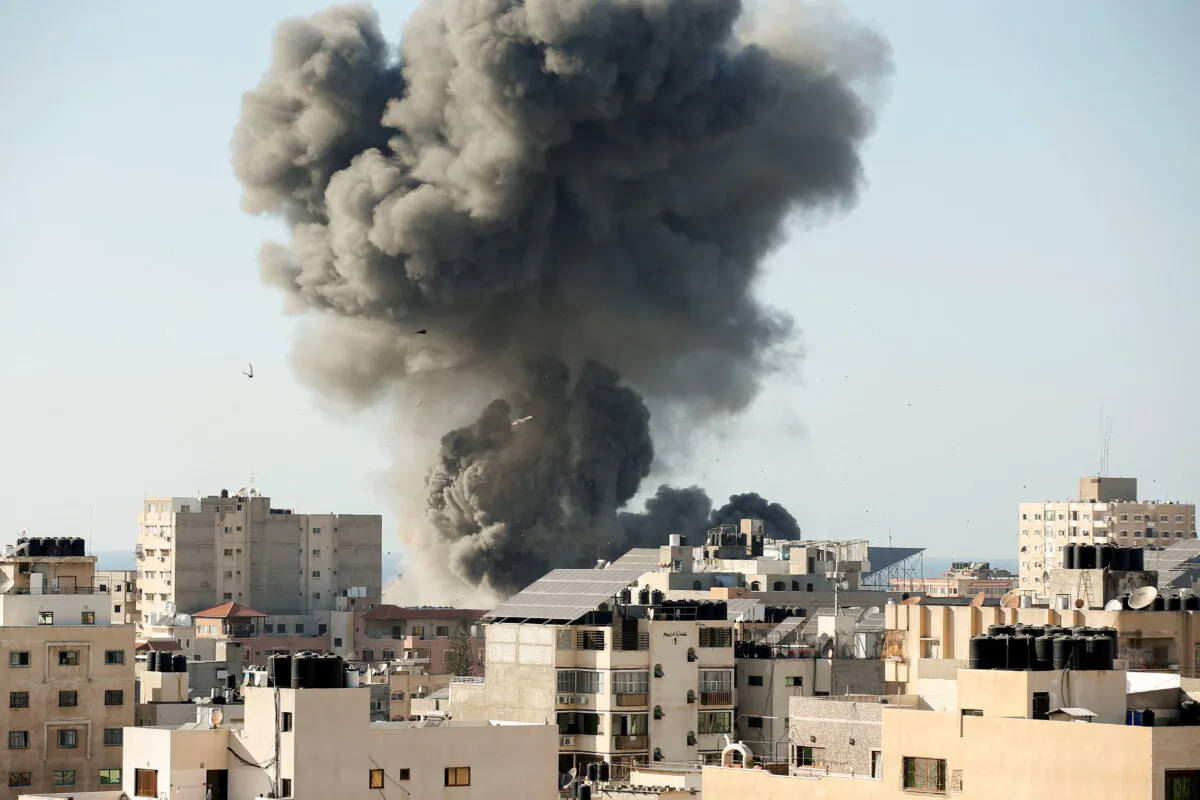 Smoke rises during an Israeli air strike in Gaza City, on May 14, 2021. (Suhaib Salem/Reuters)