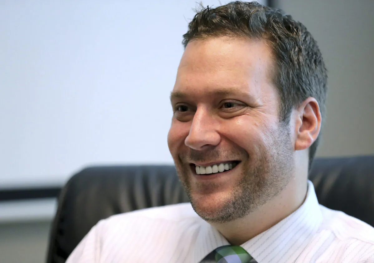 In this Sept. 30, 2019, file photo, Seminole County Tax Collector Joel Greenberg talks to the Orlando Sentinel during an interview at his office in Lake Mary, Fla. (Joe Burbank/Orlando Sentinel via AP, File)