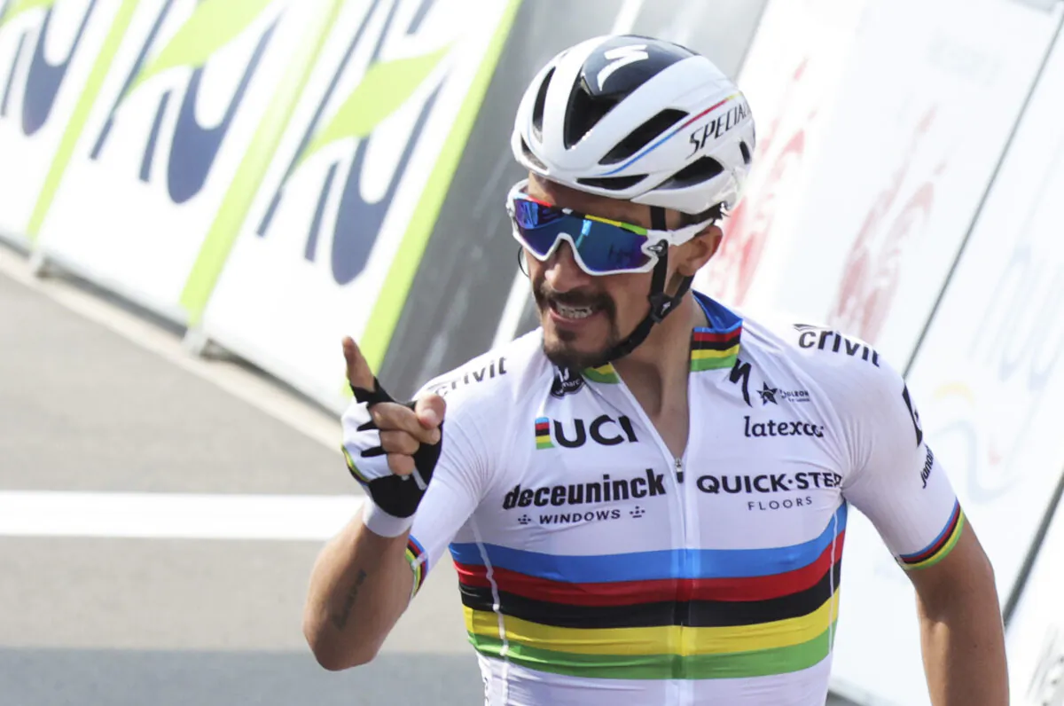 France's Julian Alaphilippe of the Deceuninck Quick-Step team crosses the finish line to win the Belgian cycling classic and UCI World Tour race Fleche Wallonne, in Huy, Belgium on Wednesday, April 21, 2021. (Olivier Matthys/AP Photo)