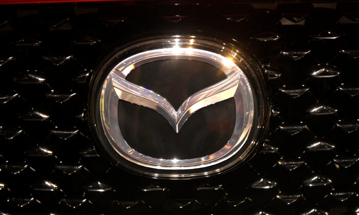 The logo of Mazda is pictured at the LA Auto Show in Los Angeles, California, U.S., November 20, 2019. (Andrew Cullen/Reuters)