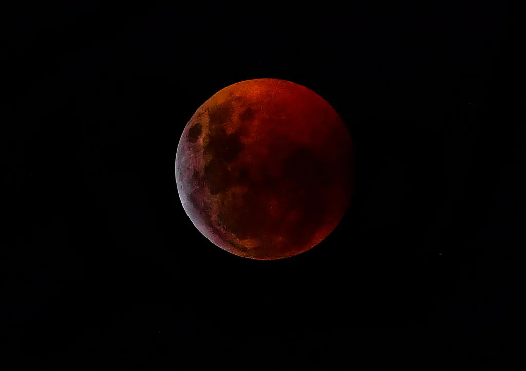 The Super Blood Wolf Moon total lunar eclipse is seen from Panama City, Panama, on Jan. 20, 2019. (Luis Acosta/AFP via Getty Images)